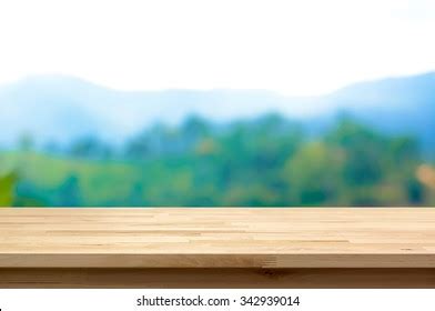 Wood Table Top On Blur Mountain ภาพสต็อก 339693407 | Shutterstock