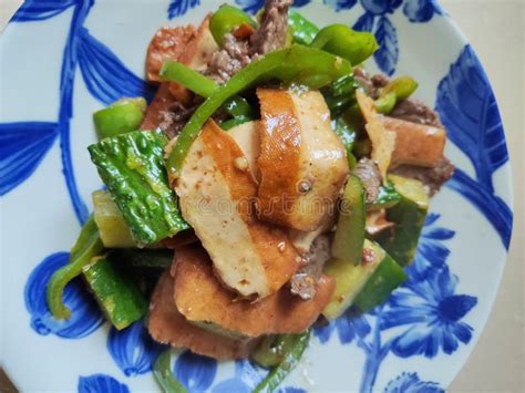 Bean Curd and Green Vegetables Scrambled with Fresh Beef Stock Photo - Image of food, blue ...