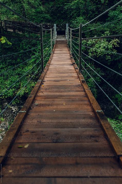 "Wooden Bridge Across A Mountain River" by Stocksy Contributor "Blue ...