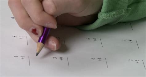 Girl Working Math Practice Problems On Stock Footage SBV-304447066 ...