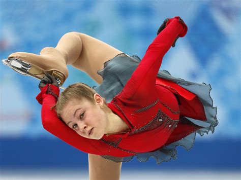 Winter Olympics 2014: Russia wins its first gold in team figure skating - CBS News