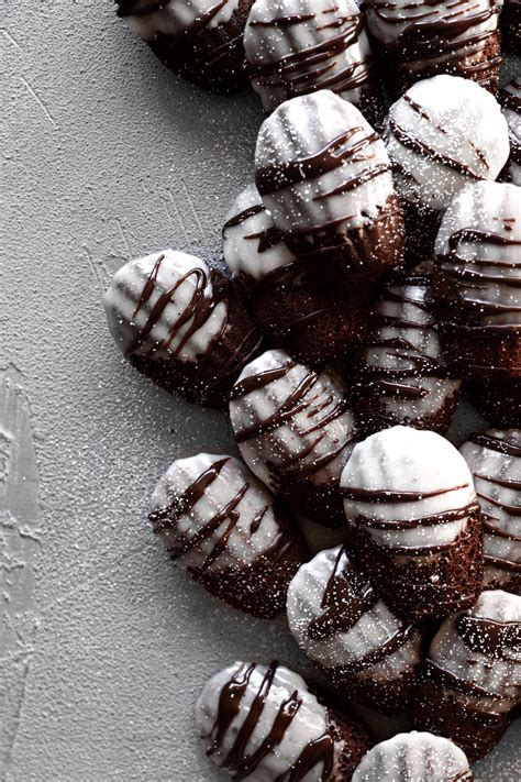 Hot Chocolate Madeleine Cookies with Marshmallow Frosting • A Simple Pantry