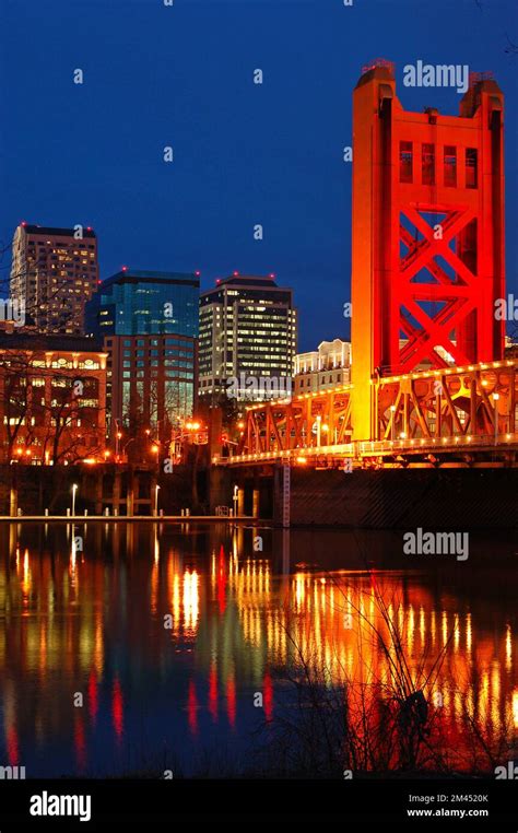 The Tower Bridge and the Sacramento, California skyline are reflected ...