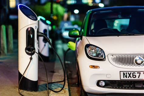 Electric Vehicle Charging Station Stock Photos, Pictures & Royalty-Free Images - iStock