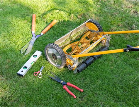 Premium Photo | Lawn mowing equipment and work tools