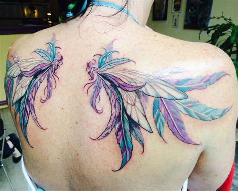 Pin by Nicki Tel on Tattoos | Wing tattoo on shoulder, Neck tattoo ...