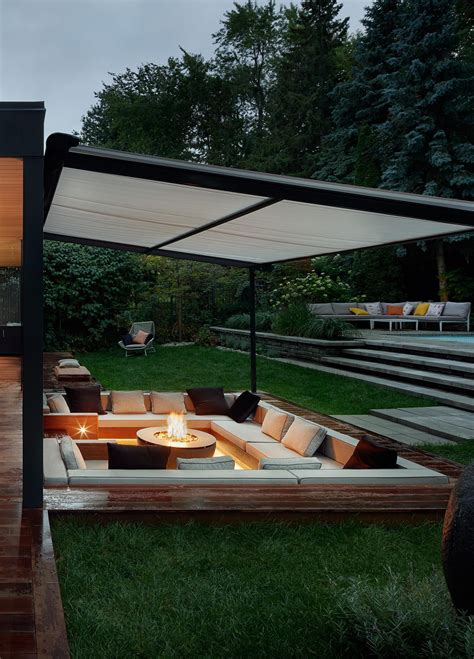 A Covered Outdoor Conversation Pit With A Fire Bowl Creates A Cozy ...