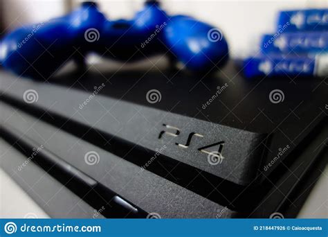 Sony Black Playstation 4 Pro Game Console and Blue Wireless Controller Editorial Photo - Image ...