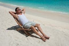 Man resting on beach stock image. Image of quiet, seascape - 45240813