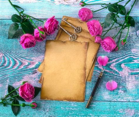 Premium Photo | Old vintage paper ink pen vintage keys pink peony rose flowers love letter concept