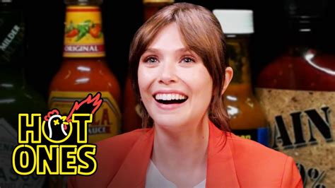 Elizabeth Olsen Feels Brave While Eating Spicy Wings | Hot Ones | Complex