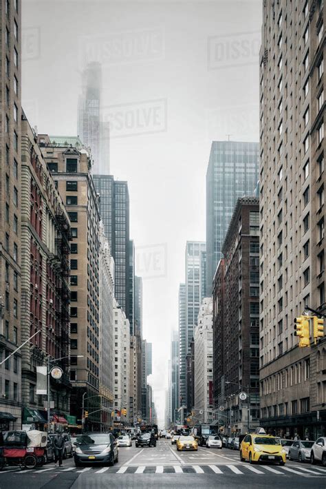 New York City street and buildings, Sixth Avenue, New York, USA - Stock Photo - Dissolve