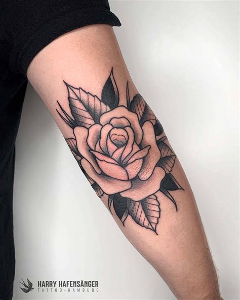 Black Traditional Old School Rose Elbow Tattoo | Elbow tattoos, Rose ...