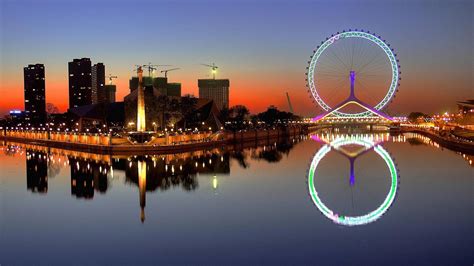 Download The Tianjin Eye At Sunset Wallpaper | Wallpapers.com