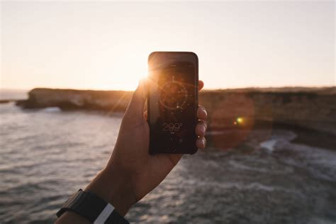 Free Images : iphone, smartphone, hand, beach, sea, coast, sand, ocean, horizon, sky, sunset ...