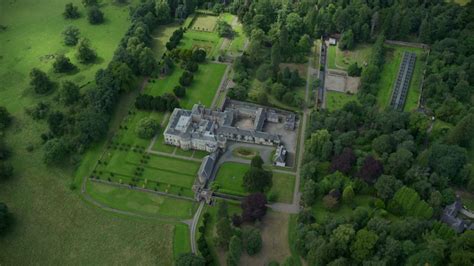 6K stock footage aerial video of Keir House surrounded by trees ...