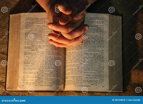 Praying Hands Bible Stock Photography | CartoonDealer.com #38144816