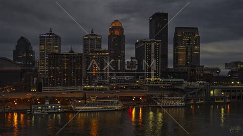 The city skyline of Downtown Louisville, Kentucky at nighttime Aerial ...