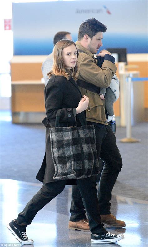 Carey Mulligan joins husband Marcus Mumford and baby Evelyn at LAX | Daily Mail Online