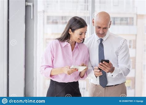 Group of Business People Standing at the Office while Working Together ...