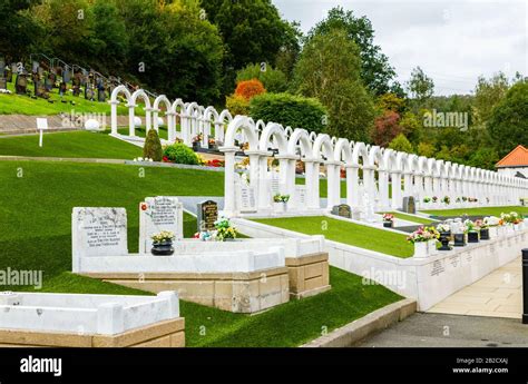 Memorial arches in Bryntaf Cemetery, Aberfan Cemetery, Mid Glamorgan, Wales, resting place of ...