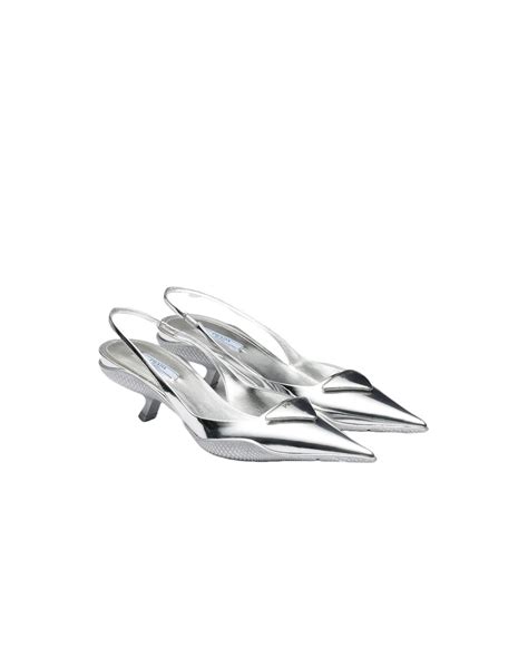 Katie Holmes Steps Out in High-Shine Metallic Heels