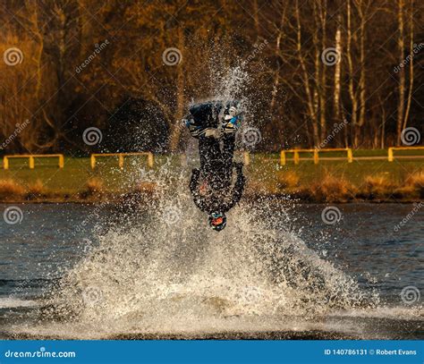 Stunts with a jet ski stock image. Image of outdoors - 140786131