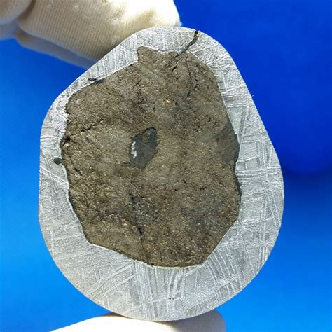 Meteorite muonionalusta Widmanstatten pattern with troilite inclusion - 97.42gm - Catawiki