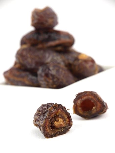 Premium Photo | Dried black dates