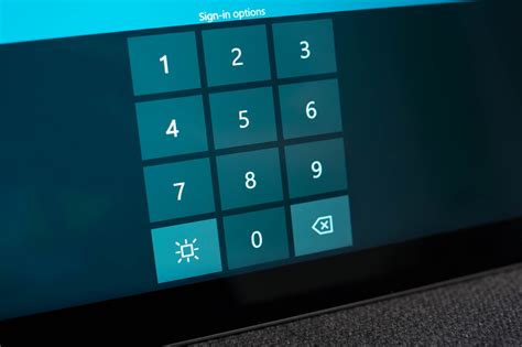 What is that square icon on the Windows 10 sign-in screen? | Windows ...