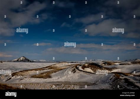 MÝVATN, ICELAND - CIRCA MARCH 2015: Frozen Mývatn lake at night during winter time. This is a ...