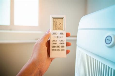 Premium Photo | An air conditioning remote control