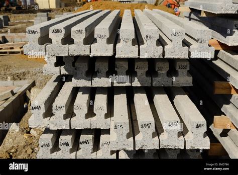 Reinforced concrete beams for a beam and block floor on a UK construction site Stock Photo - Alamy