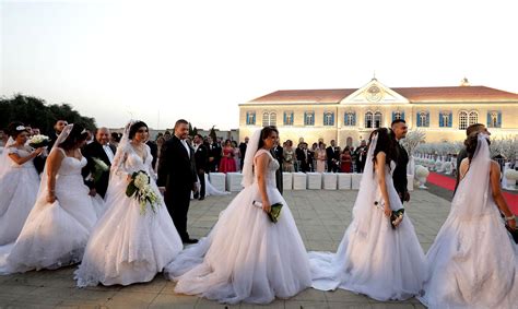 In pictures: Lebanese Maronite Christian couples take part in a mass ...