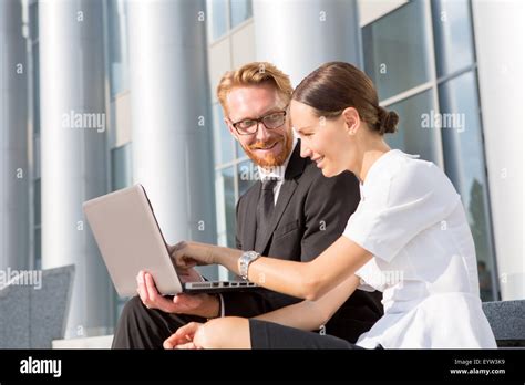 Business people with laptop Stock Photo - Alamy