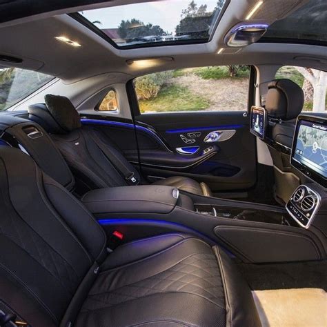 The backseat of the all-new Mercedes-Maybach S600 features a panoramic sunroof, Nappa leather ...