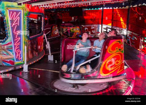 Three girls on Waltzer ride at Funfair on Seaton Carew sea front ...