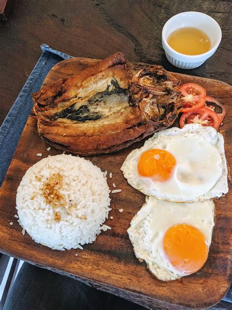 [I ate] A hearty breakfast of fried milkfish eggs and garlic rice ...