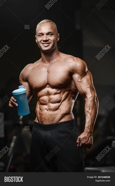 Sport Muscular Fitness Image & Photo (Free Trial) | Bigstock