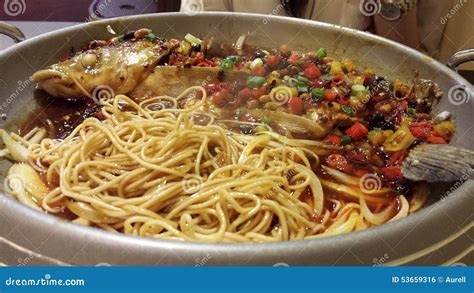 Fish and Noodles with Spicy Sauce Stock Photo - Image of chinese, sauce: 53659316