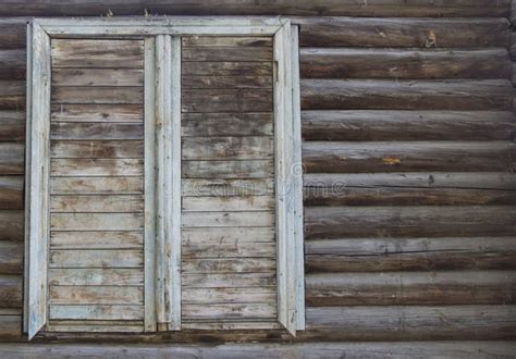 Old House With Boarded Up Window. Boarded-up Windows Of An Old Building ...