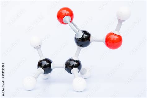 Propanoic acid molecular structure isolated on white background. Chemical formula is C3H6O2 ...