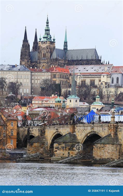 First Snow in Prague, Snowy Gothic Castle with the Charles Bridge ...