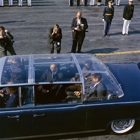 President John F. Kennedy and Ivory Coast President Felix Houphouet-Boigny in bubble-top ...