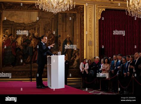 French President Emmanuel Macron arrives to deliver a speech to French ...