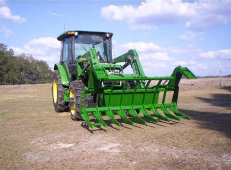 Wallace Attachments series I heavy duty tractor grapple root rake attachment