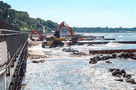 Construction Of Breakwaters, Construction Equipment On The Sea Coast Editorial Stock Image ...