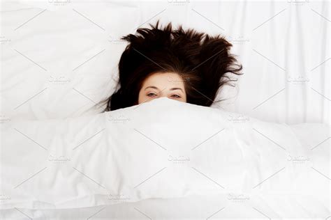 Scared woman in bed. | High-Quality People Images ~ Creative Market