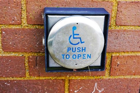 Premium Photo | Handicap push button door opener