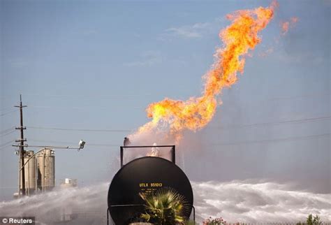 Burning rail car holding 29,000-gallons of propane could explode like a 'small thermal nuclear ...